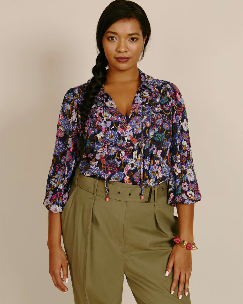 Front of a model wearing a size L Aniela Top in Mixed Meadow Navy by Tanya Taylor. | dia_product_style_image_id:224437